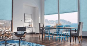 Blog 3 Blue cellular shade treatments in modern dining room with ocean view