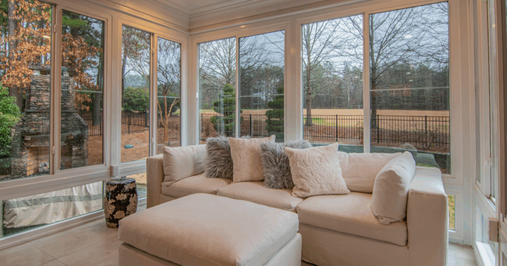 Bright living room with large windows to measure for custom blinds showcasing natural light before adding custom blinds.