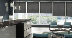 Modern room with dark roller shades providing energy efficiency, privacy, and added home value.
